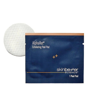 Skinbetter AlphaRet Exfoliating Peel Pad with pad in background.