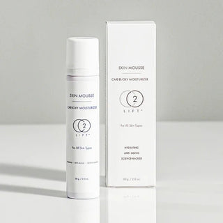 C2 Lift skin mousse bottle and packaging on a gray background