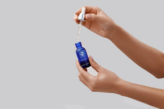 IS Clinical Active Serum with Model Hands