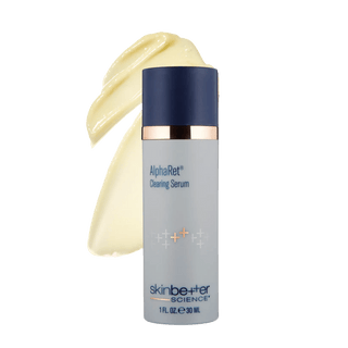 AlphaRet clearing serum bottle with a swatch of cream on a white background