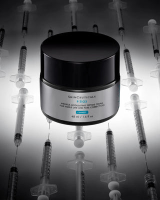 Skinceuticals jar with syringes in the background