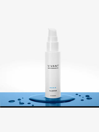 A white cylindrical pump bottle labeled VIVANT ALLANTOUR PRO-VITAMIN MOISTURIZING SERUM, standing on a reflective blue surface with water droplets against a white background.