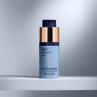 An open bottle of Skinbetter Mystro Active Balance Serum 15ml bottle on a table with a soft shadow.